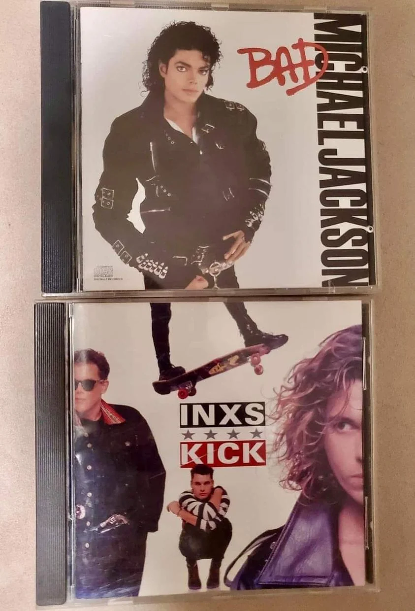 If you place Michael Jackson's Bad album above the album Kick by INXS you will get a hilarious result.