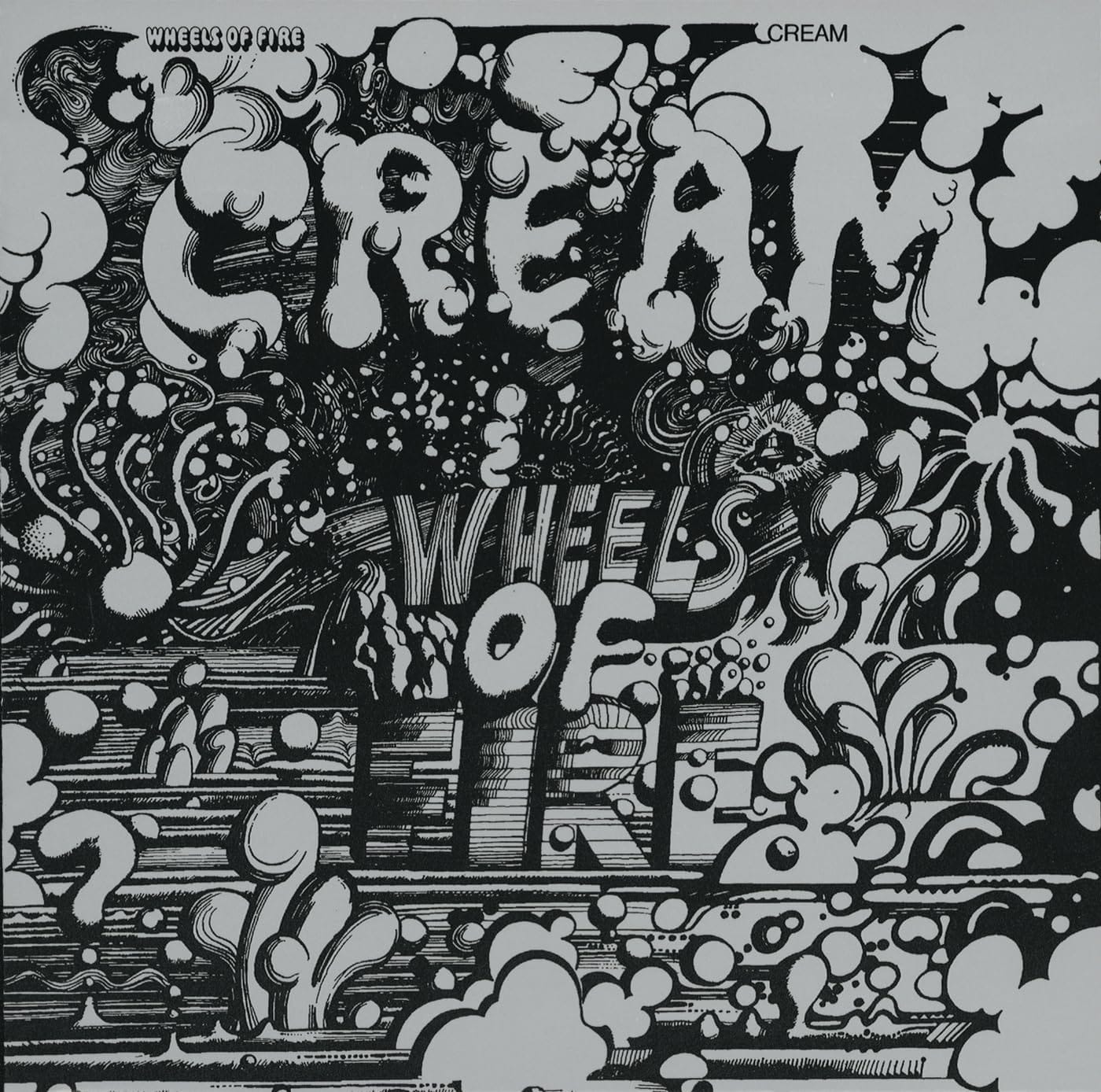 Cream Wheels of Fire album cover artwork designed by Martin Sharp featuring a dense, psychedelic black ink illustration of bubbling clouds, swirls, and abstract mechanical shapes against a reflective metallic silver foil background.