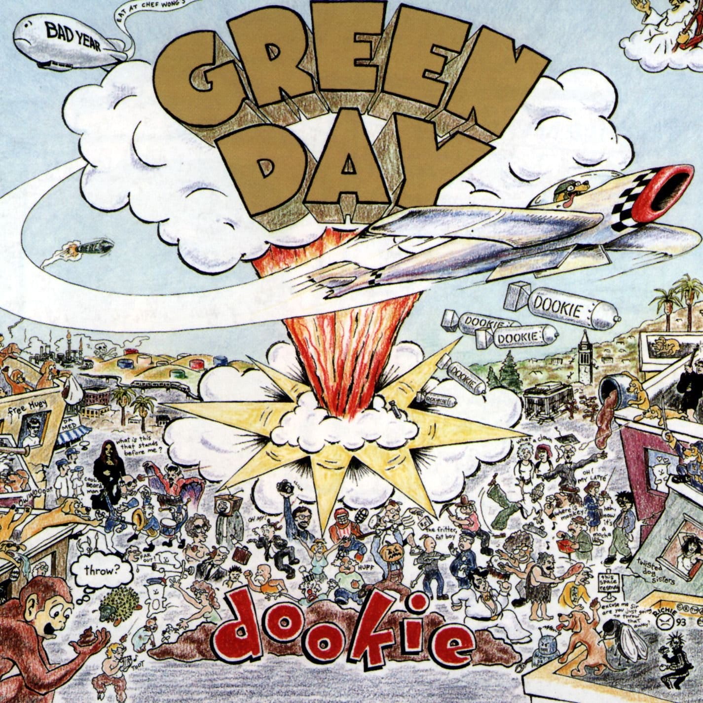 Green Day's Dookie album cover artwork, showing a densely detailed cartoon scene of Berkeley with collapsing buildings, explosions, flying debris, crowds of people and surreal characters, with the band name Green Day and the album title Dookie prominently displayed