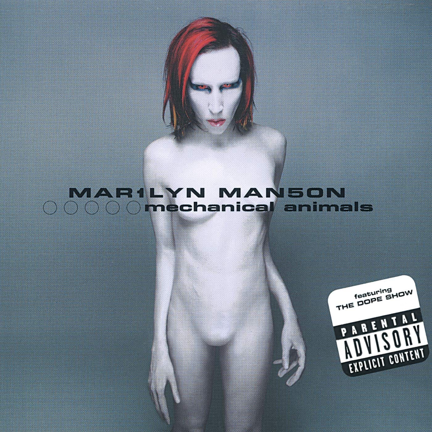 Marilyn Manson styled as a pale, androgynous alien figure called Omega, with smooth prosthetic skin and six fingers, posed against a plain background, with the band's logo stylised as "MAR1LYN MAN5ON."