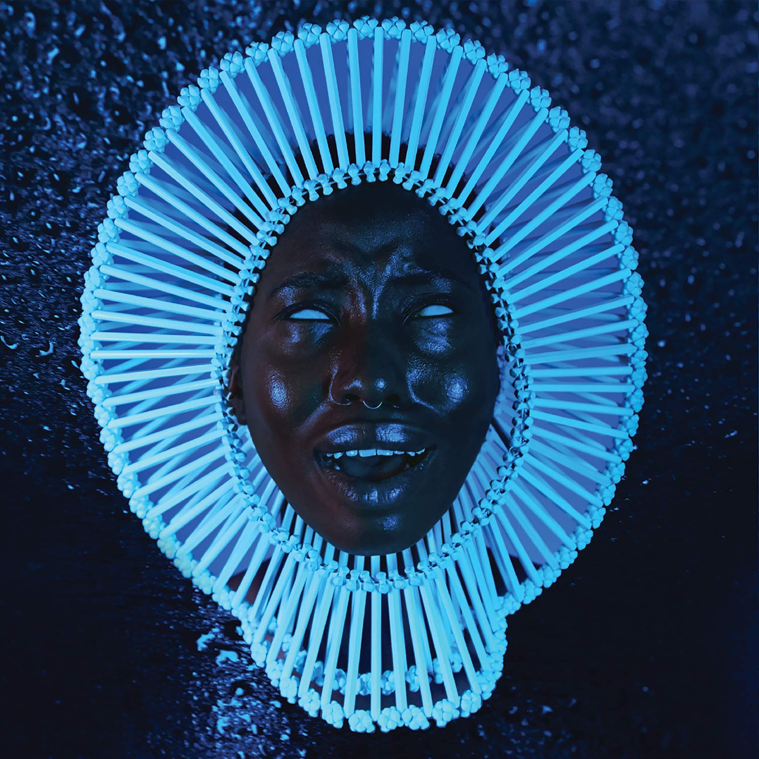 Cover of Childish Gambino’s 2016 album “Awaken, My Love!”, featuring model Giannina Oteto in an intricate beaded headdress by Laura Wass, photographed by Ibra Ake as a nod to Funkadelic’s Maggot Brain.