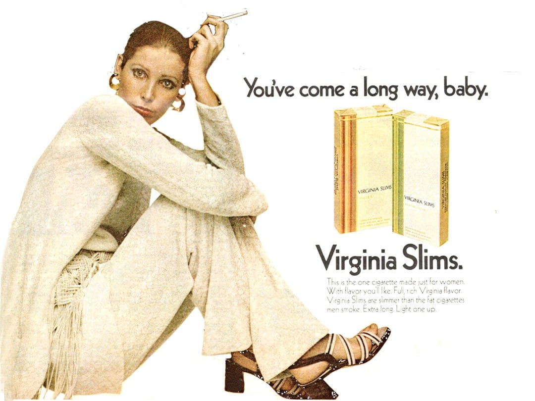 Virginia Slims cigarettes advertising campaign featuring a woman in all white smoking a cigarette