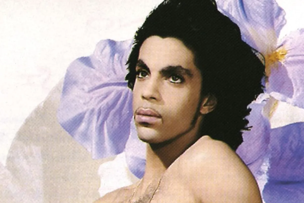 Prince naked on a flower Lovesexy album cover photo by Jean-Baptiste Mondino